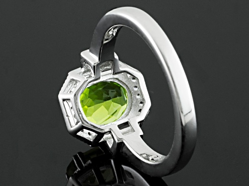 Pre-Owned 2.11ct Oval Manchurian Peridot™ With .59ctw Baguette And Round White Zircon Silver Ring - Size 11