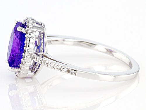 Pre-Owned 1.63ctw Oval Tanzanite & .17ctw Round White Zircon Rhodium Over Sterling Silver Halo Ring - Size 8
