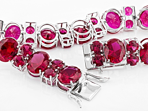 74.97ctw Oval And Round Lab Created Ruby Sterling Silver Bracelet - Size 7.25