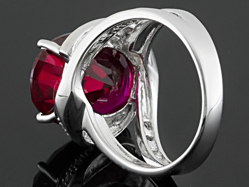 11.66ct Oval Lab Created Ruby And .14ctw Round Lab Created White Sapphire Rhodium Over Silver Ring - Size 7