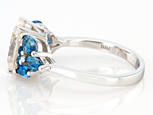3.25ct Oval Strontium Titanate and .90ctw London Blue Topaz Rhodium Over Silver Ring - Size 6
