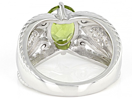 1.64ctw Oval Manchurian Peridot(TM) With 0.39ctw Round White Zircon Rhodium Over Silver Ring - Size 8