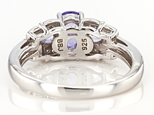 .92CTW OVAL AND PEAR SHAPE TANZANITE WITH .07CTW WHITE ZIRCON RHODIUM OVER STERLING SILVER RING - Size 8