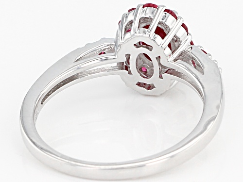 .80ct oval Burmese ruby with .33ctw round red spinel rhodium over sterling silver ring - Size 10