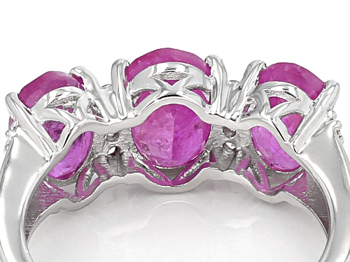 3.96ctw Oval Mahaleo® Pink Sapphire With .09ctw Round White Topaz Sterling Silver 3-Stone Ring - Size 7