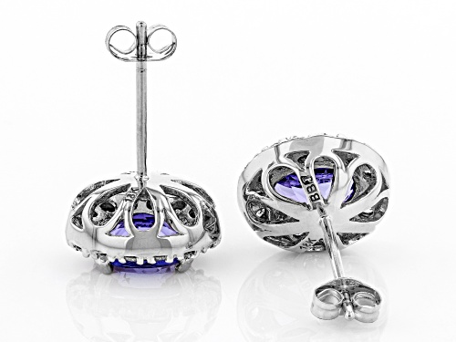 1.28ctw Oval Tanzanite With .39ctw Round White Diamonds Rhodium Over 18k White Gold Stud Earrings
