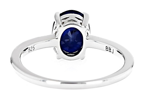 1.68ct Oval Blue Sapphire With 0.02ctw Blue Diamond Accent Rhodium Over Sterling Silver Ring - Size 7