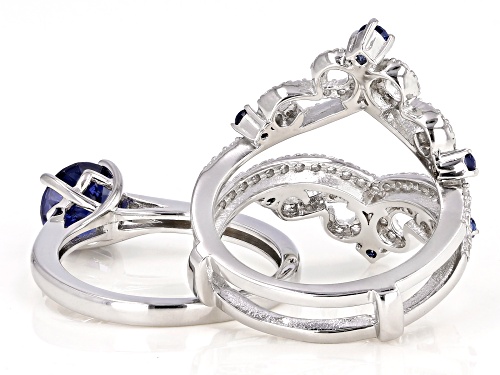 Bella Luce ® 3.92ctw Esotica ™ Tanzanite and White Diamond Simulants Rhodium Over Sterling Ring - Size 6