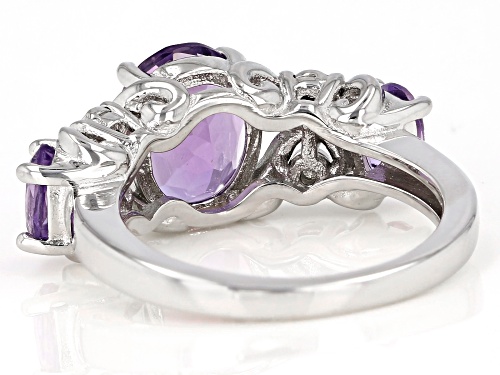 2.78ctw Oval Amethyst With 0.02ctw Round White Diamond Accent Rhodium Over Sterling Silver Ring - Size 5