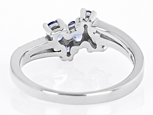 0.43ct Oval And 0.10ctw Round Tanzanite With .03ctw White Zircon Rhodium Over Silver Bypass Ring - Size 7
