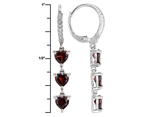.51ctw Heart Shape Vermelho Garnet™ And .02ctw Round White Topaz Rhodium Over Silver Dangle Earrings