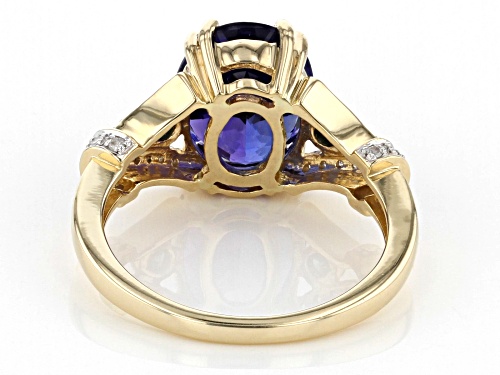 3.75ct Oval Blue Tanzanite With 0.20ctw Blue And White Diamond 14k Yellow Gold Ring - Size 7
