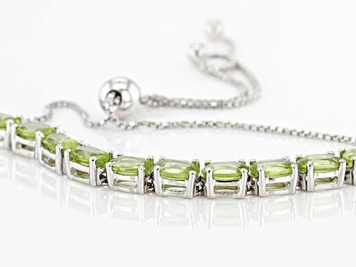 4.40ctw Oval Peridot Rhodium Over Silver Adjusts Approximately 6