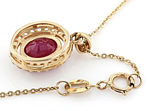 1.75ct Oval Burma Ruby With .30ctw Round White Zircon 10k Yellow Gold Pendant With Chain
