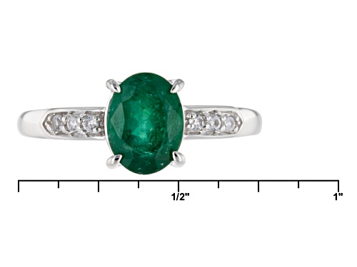 1.16ct Oval Emerald Color Apatite With .06ctw Round White Zircon Rhodium Over 10k White Gold Ring. - Size 7