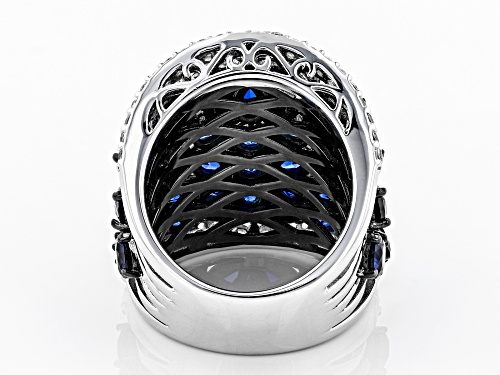 8.23CTW LAB CREATED BLUE SAPPHIRE WITH .79CTW WHITE ZIRCON RHODIUM OVER STERLING SILVER RING - Size 7