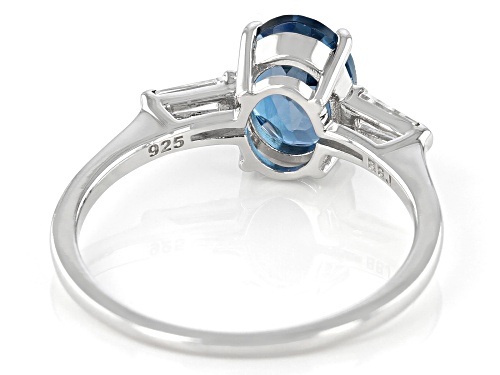 1.32ct Oval London Blue Topaz With .17ctw Tapered Baguette White Topaz Rhodium Over Silver Ring - Size 9