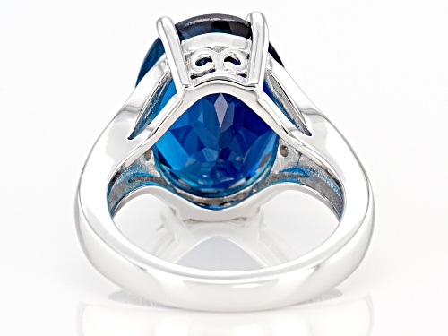 10.91ct Oval London Blue Topaz With .38ctw Round White Zircon Rhodium Over Silver Ring - Size 9