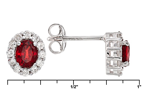 .83ctw Oval Red Sapphire And .42ctw Round White Zircon Sterling Silver Stud Earrings