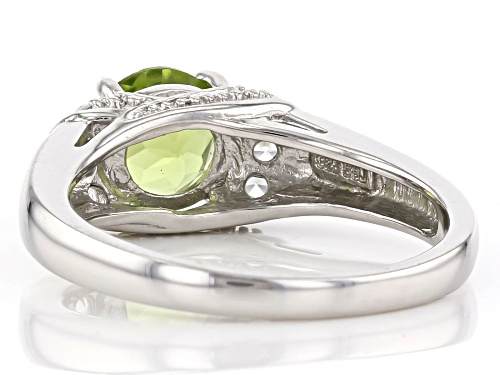 1.52ct Round Manchurian peridot™ with .28ctw round white zircon rhodium over sterling silver ring - Size 10