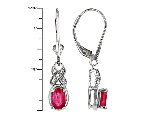 .85ct Oval Ruby And .07ctw Round White Zircon Sterling Silver Dangle Earrings