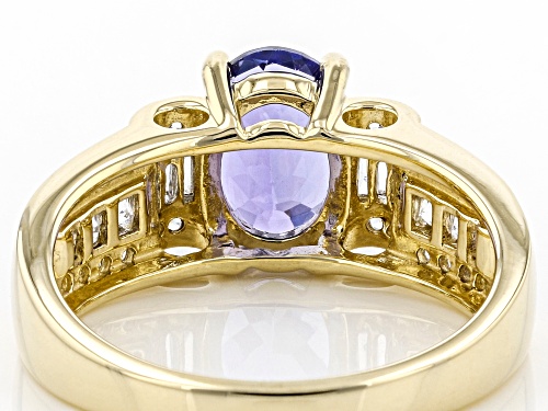 1.19ct Oval Tanzanite With 0.19ctw Round Sapphire And 0.07ctw Baguette Diamond 10K Yellow Gold Ring - Size 7
