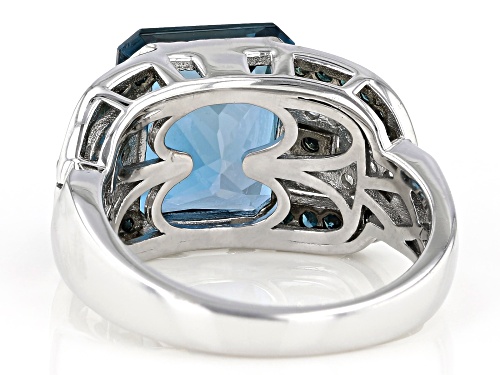 6.38ct LONDON BLUE TOPAZ WITH 0.46ctw BLUE AND WHITE DIAMOND RHODIUM OVER STERLING SILVER RING - Size 7