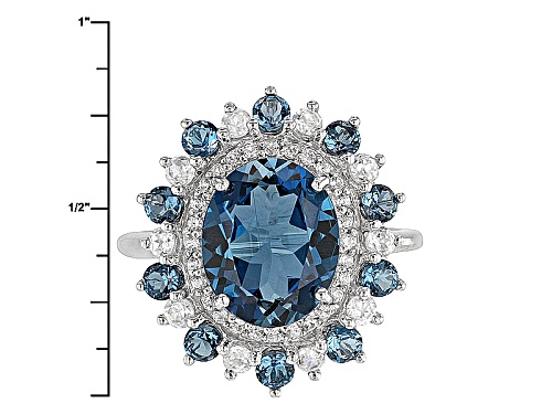 3.05ct Oval And .71ctw Round London Blue Topaz And .62ctw White Zircon 10k White Gold Ring - Size 8