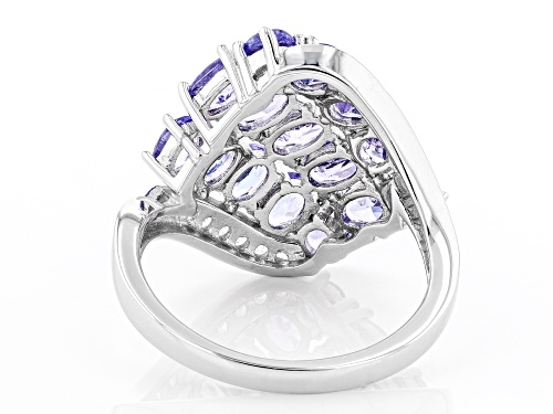 2.30ctw Oval And Round Tanzanite With .26ctw Zircon Rhodium Over Silver Cluster Ring - Size 7