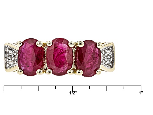 2.16ctw Oval Ruby With .02ctw Round White Zircon 10k Yellow Gold 3 Stone Band Ring - Size 9