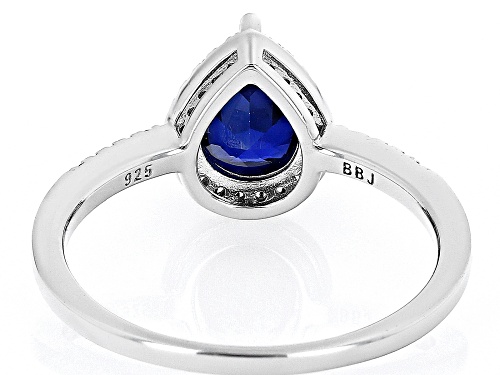 Pre-Owned 1.15ct Pear Shape Lab Created Blue Sapphire With 0.26ctw White Zircon Rhodium Over Silver - Size 9