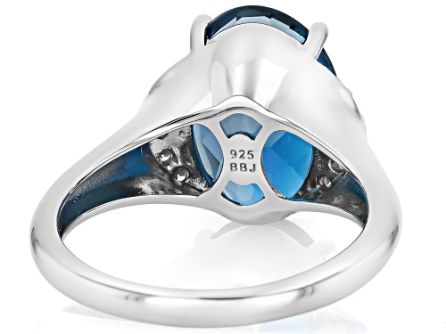 Pre-Owned 6.56ct Oval London Blue Topaz With .11ctw White Prazana® Lab Grown Diamonds Rhodium Over S - Size 6