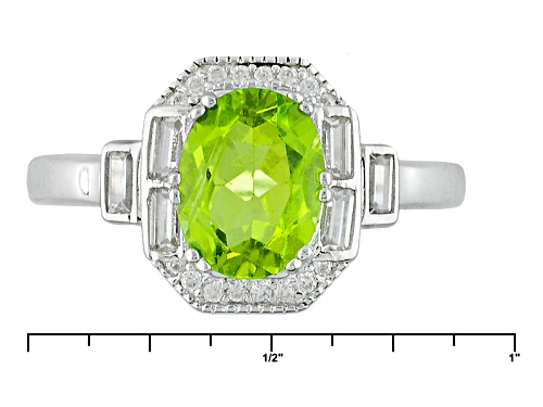 Pre-Owned 2.11ct Oval Manchurian Peridot™ With .59ctw Baguette And Round White Zircon Silver Ring - Size 11