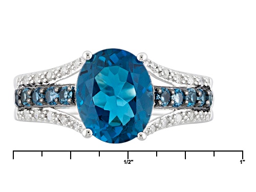 Pre-Owned 3.23ctw Oval And Round London Blue Topaz With .10ctw White Diamond Sterling Silver Ring - Size 5