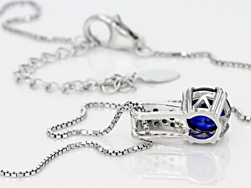 2.24CT ROUND LAB CREATED BLUE SAPPHIRE WITH .08CTW ROUND BLUE DIAMOND SILVER PENDANT WITH CHAIN