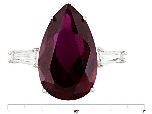 7.86ct Pear Shape Lab Created Ruby, .43ctw Tapered Baguette Lab Created White Sapphire Silver Ring - Size 12