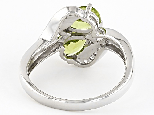 1.21ctw Oval Manchurian Peridot™ With 0.09ctw White zircon Rhodium Over Silver Bypass Ring - Size 8