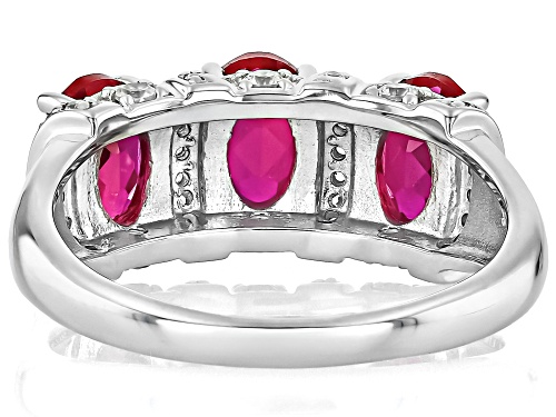 2.95ct Oval Lab Created Ruby With .042ctw Round White Zircon Rhodium Over Silver Ring - Size 6