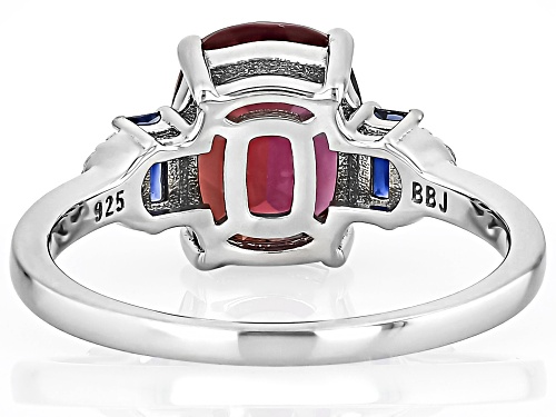 2.10ct Lab Bixbite with 0.18ctw Lab Blue & Lab White Sapphire Rhodium Over Sterling Silver Ring - Size 6