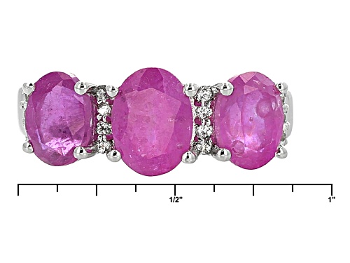 3.96ctw Oval Mahaleo® Pink Sapphire With .09ctw Round White Topaz Sterling Silver 3-Stone Ring - Size 7