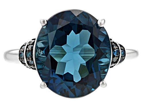8.16CT OVAL LONDON BLUE TOPAZ WITH .10CTW ROUND BLUE DIAMOND RHODIUM OVER STERLING SILVER RING - Size 9