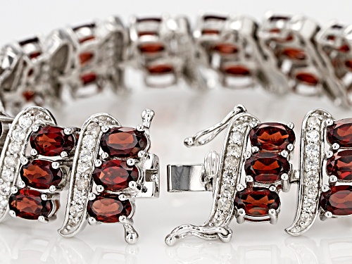 28.50ctw Oval Red Garnet With 4.00ctw Round White Zircon Rhodium Over Sterling Silver Bracelet - Size 7