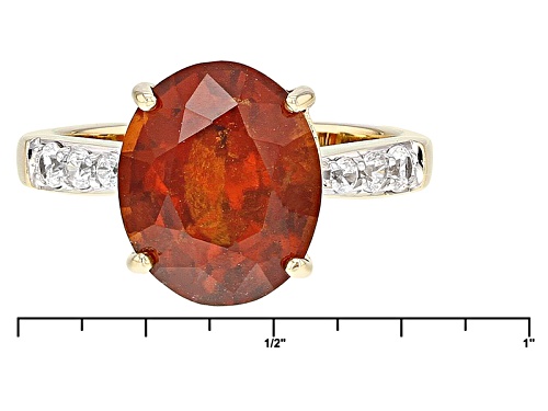 4.30ct Oval Hessonite Garnet And .26ctw Round White Zircon 10k Yellow Gold Ring - Size 7