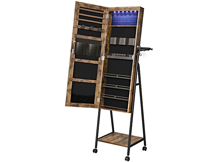 Close-up view of the interior compartments of a jewelry cabinet with slots and organizers.