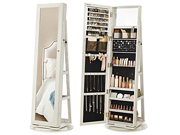 Open jewelry armoire with multiple compartments and a mirror showing the interior