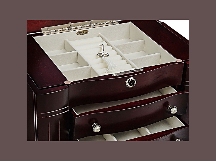 Open jewelry box with compartments