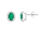7x5mm Oval Created Emerald And Created White Sapphire 10k White Gold Halo Stud Earrings