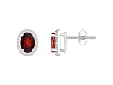 7x5mm Oval Garnet And Created White Sapphire 10k White Gold Halo Stud Earrings