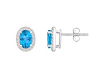 7x5mm Oval Blue Topaz And Created White Sapphire 10k White Gold Halo Stud Earrings