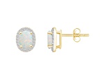 7x5mm Oval Created Opal And Created White Sapphire 10k Yellow Gold Halo Stud Earrings